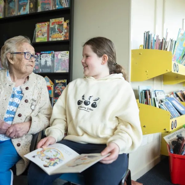 Kids and Care Home Residents Read Together